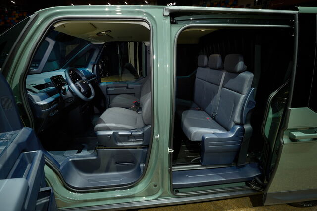 kia pv5 crew city scape green int event highres 001